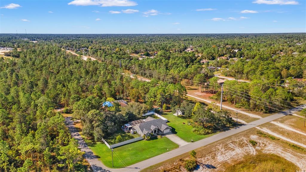 11180 Flock Avenue Weeki Wachee, FL 34613 - Photo 80 of 83 a view of an outdoor space and a lake view