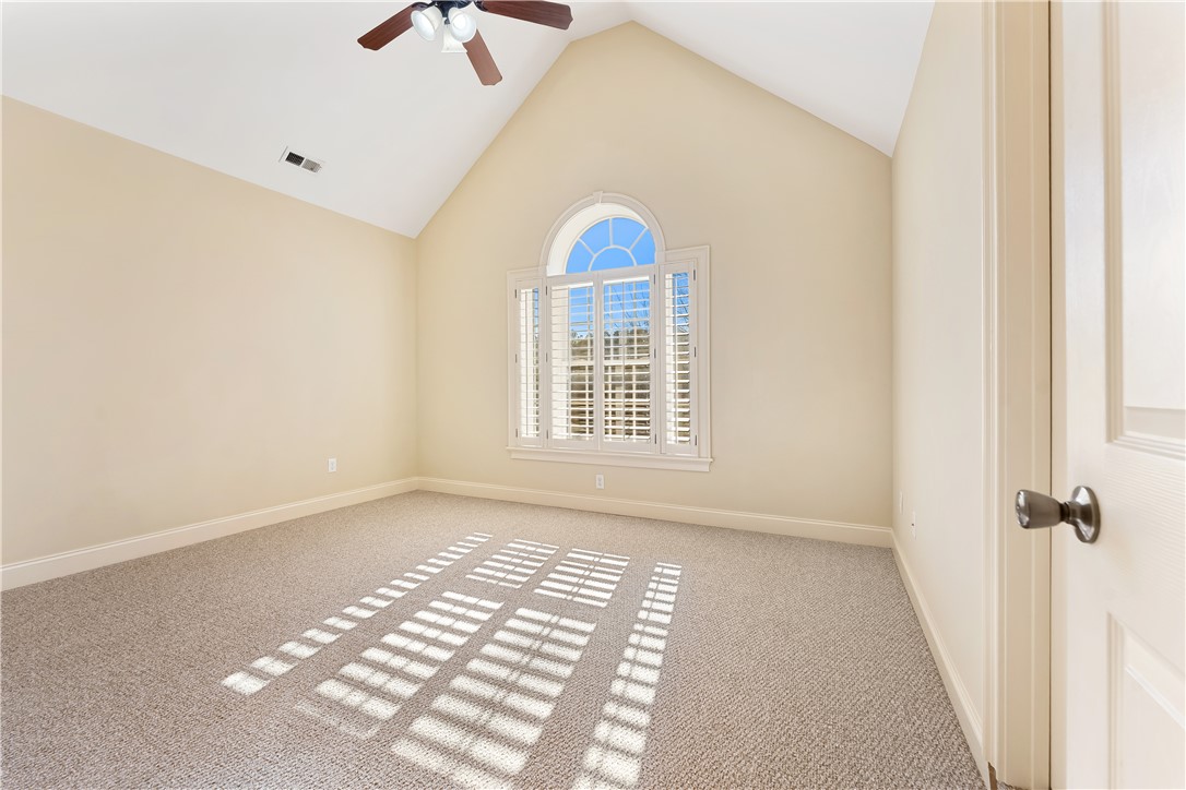 109 Limelight Drive Anderson, SC 29621 - Photo 24 of 34 This airy room features vaulted ceilings and ample natural light, creating a serene and inviting atmosphere.