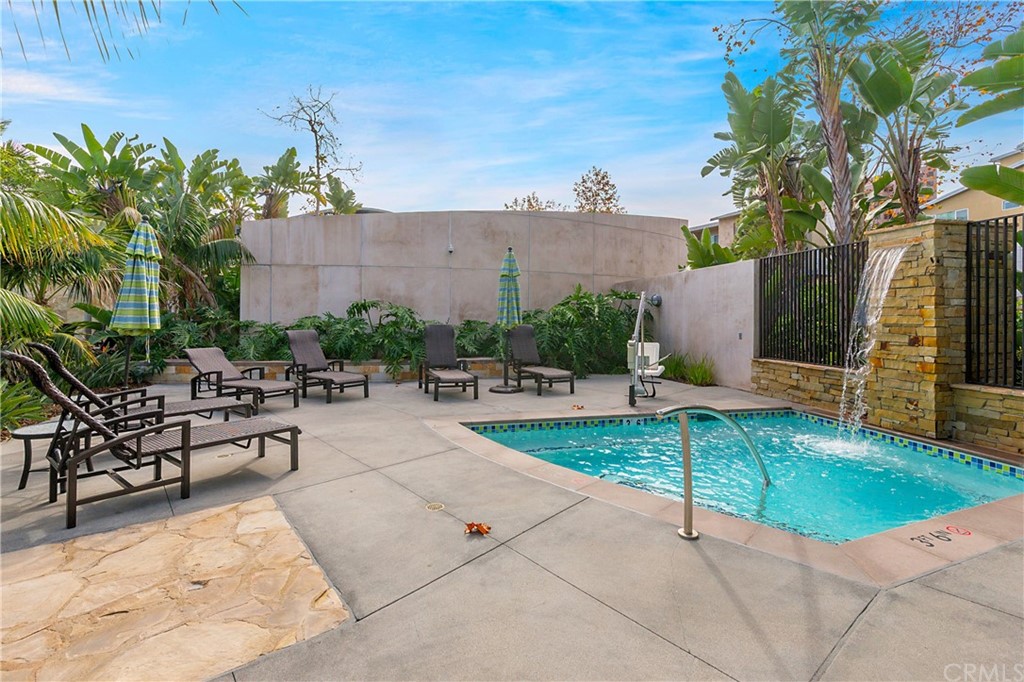 53 Waldorf Irvine, CA 92612 - Photo 20 of 28 a view of a patio with a table and chairs