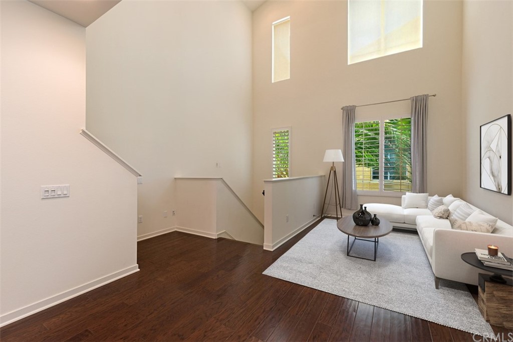 53 Waldorf Irvine, CA 92612 - Photo 5 of 28 a living room with furniture and wooden floor