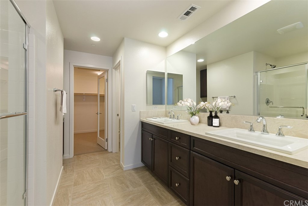 53 Waldorf Irvine, CA 92612 - Photo 8 of 28 a spacious bathroom with a double vanity sink mirror and double