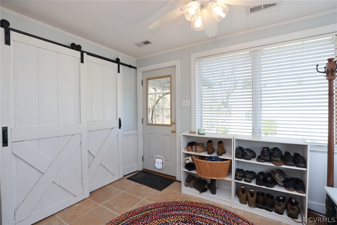 6055 White Oak Road Sandston, VA 23150 - Photo 44 of 50 Large Utility/Mud room off Kitchen W/D behind barn door