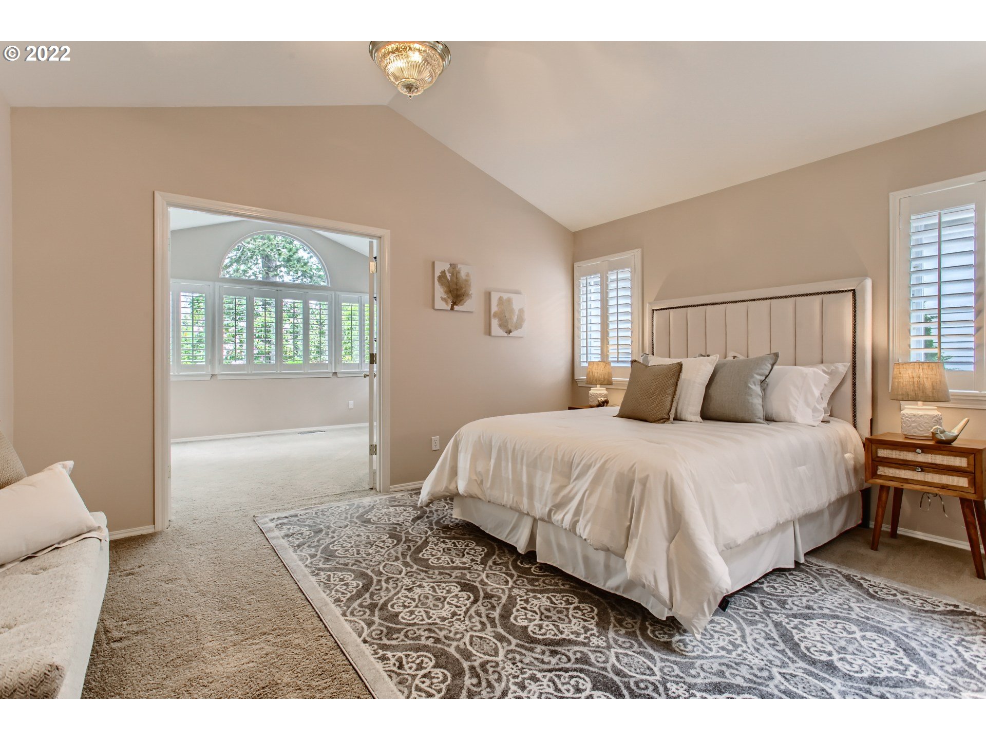 32504 Southwest Riviera Lane Wilsonville, OR 97070 - Photo 17 of 30 a spacious bedroom with a bed and a window