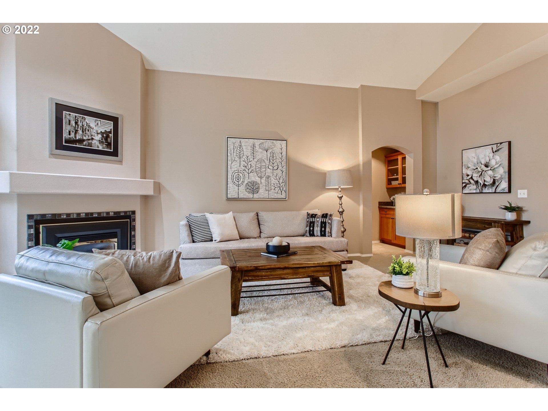32504 Southwest Riviera Lane Wilsonville, OR 97070 - Photo 8 of 30 a living room with furniture a table and a fireplace