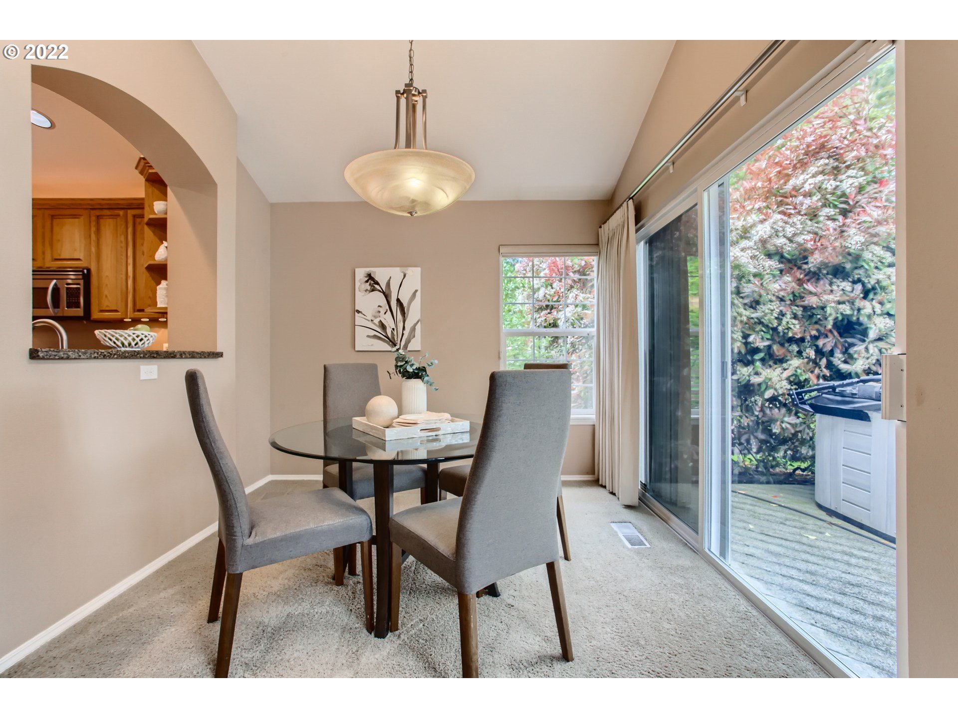 32504 Southwest Riviera Lane Wilsonville, OR 97070 - Photo 10 of 30 a view of a dining room with furniture and wooden floor