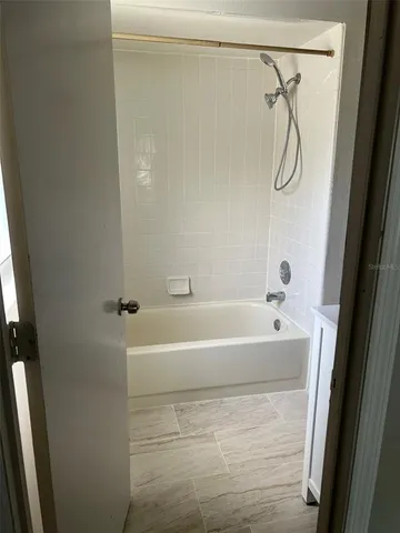 a bathroom with a bathtub