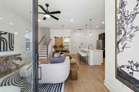 a living room with furniture and a window