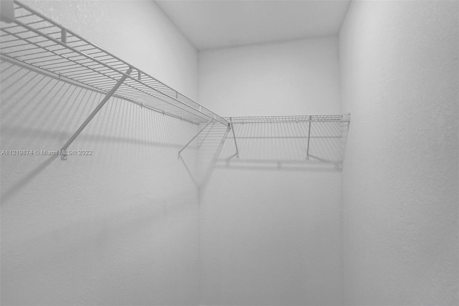 369 Northeast 158th Street Miami, FL 33162 - Photo 25 of 58 a view of a rack on the wall