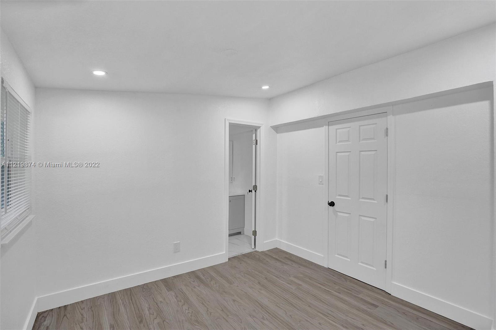 369 Northeast 158th Street Miami, FL 33162 - Photo 42 of 58 a view of an empty room