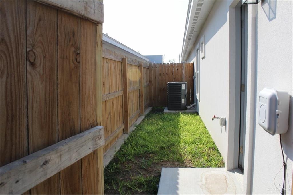 5609 Ozark Avenue, Unit 1 Mission, TX 78573 - Photo 2 of 8 a view of a back yard from a corridor