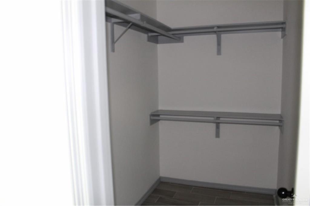 5609 Ozark Avenue, Unit 1 Mission, TX 78573 - Photo 7 of 8 a view of an empty walk in closet