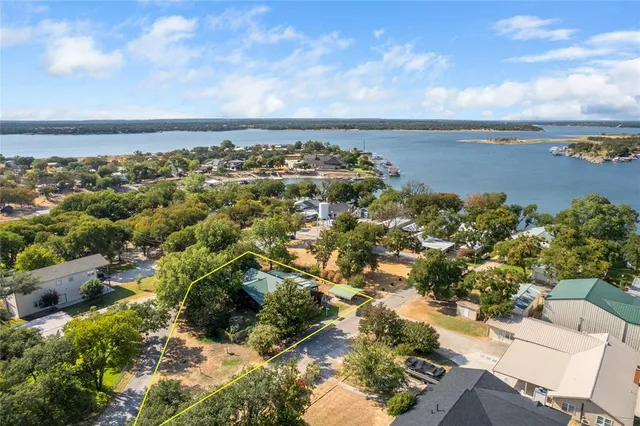 a view of street with parked cars