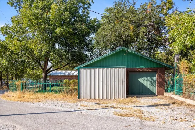 a view of house with yard