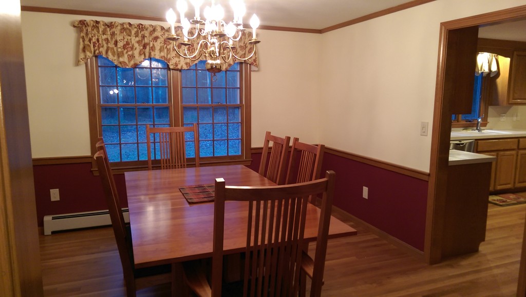 82 Walker Road Shirley, MA 01464 - Photo 12 of 27 a view of a dining room with furniture and wooden floor