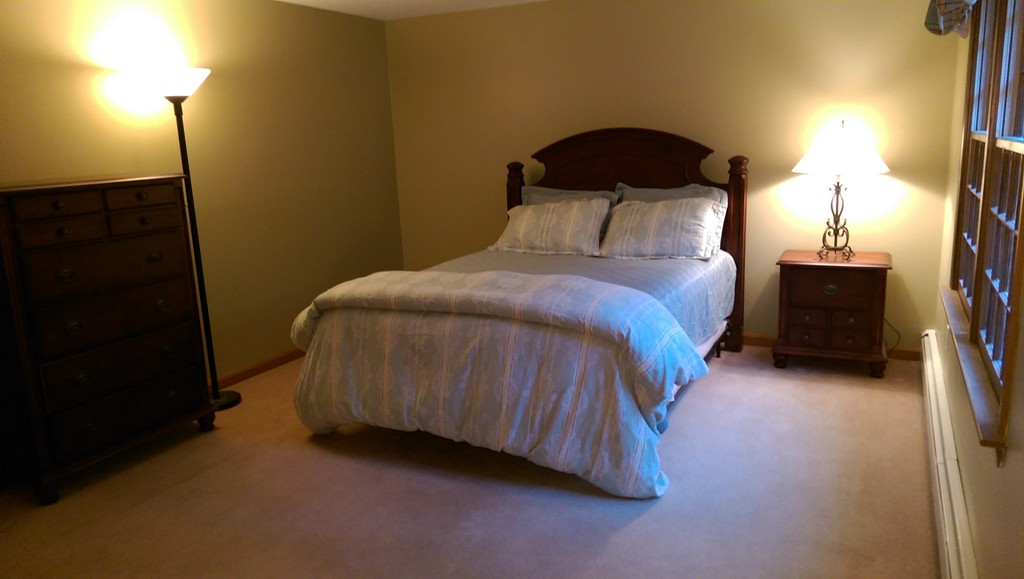 82 Walker Road Shirley, MA 01464 - Photo 19 of 27 a bedroom with a bed and a closet