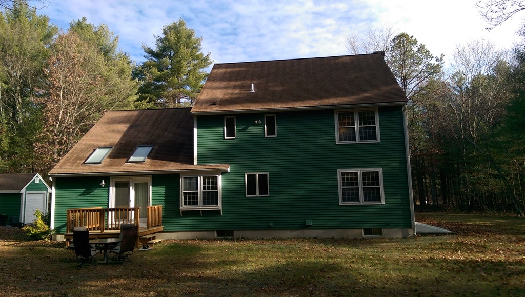 82 Walker Road Shirley, MA 01464 - Photo 3 of 27 a front view of a house with a yard