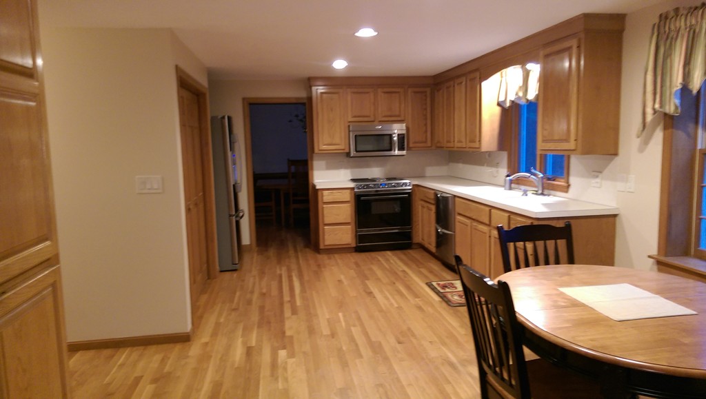 82 Walker Road Shirley, MA 01464 - Photo 4 of 27 a kitchen with stainless steel appliances granite countertop a sink stove and refrigerator