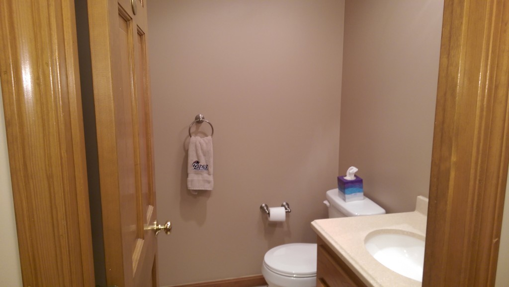 82 Walker Road Shirley, MA 01464 - Photo 9 of 27 a white toilet sitting next to a bathroom sink
