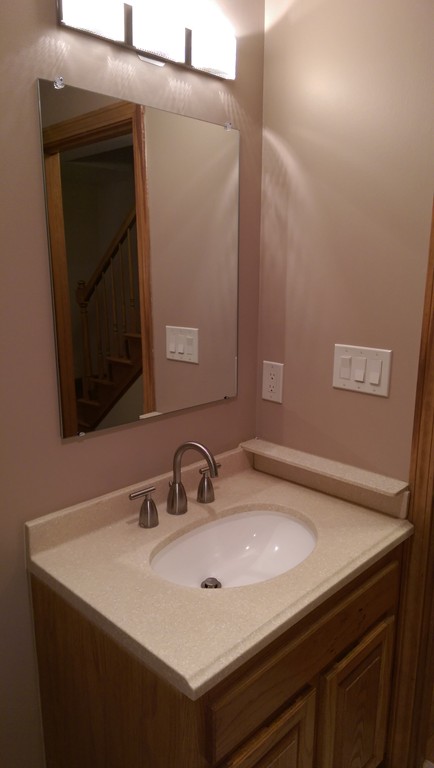 82 Walker Road Shirley, MA 01464 - Photo 10 of 27 a bathroom with a sink and a mirror
