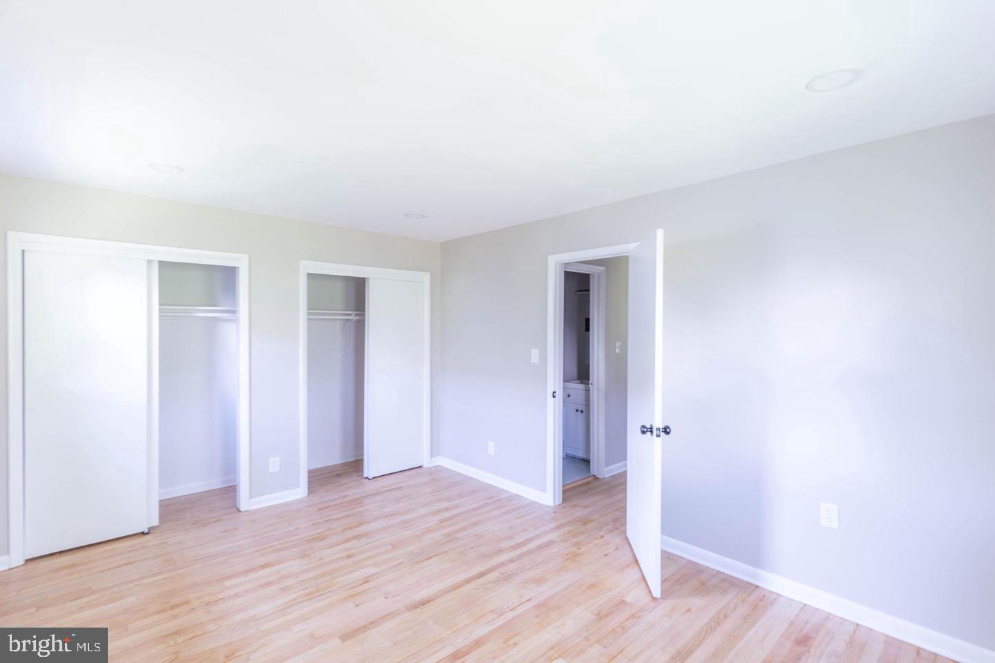 14698 Colchester Road Woodbridge, VA 22191 - Photo 12 of 15 a view of an empty room with wooden floor