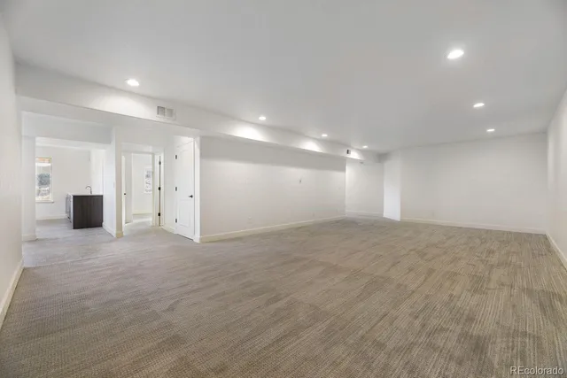 an empty room with windows