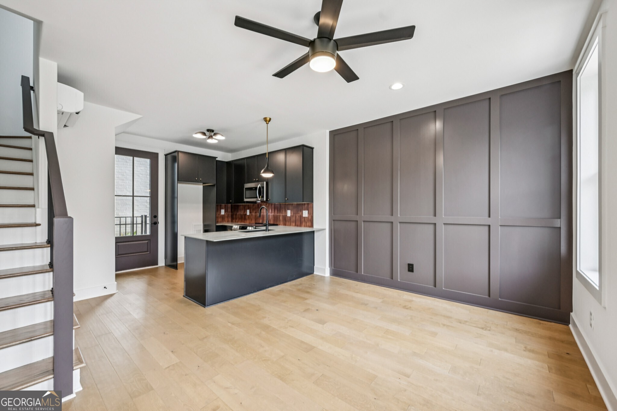 1160 Boulevard Southeast, Unit 4 Atlanta, GA 30312 - Photo 5 of 42 The Francis style in Unit 4 is bold yet timeless, with green quartz counters, matte black cabinets, and black fixtures that ground the design in modern sophistication.