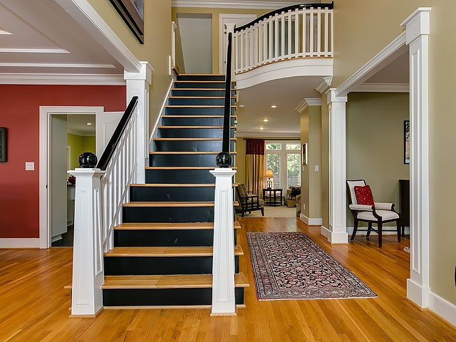 7905 Ogden Court Raleigh, NC 27613 - Photo 3 of 25 Foyer is elegant and open plus it also has a unique curved balustrade. Foyer