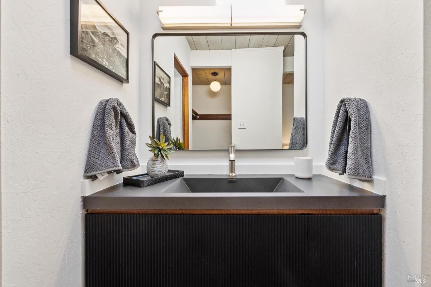 1200 Idylberry Road San Rafael, CA 94903 - Photo 37 of 58 a bathroom with a sink and a mirror