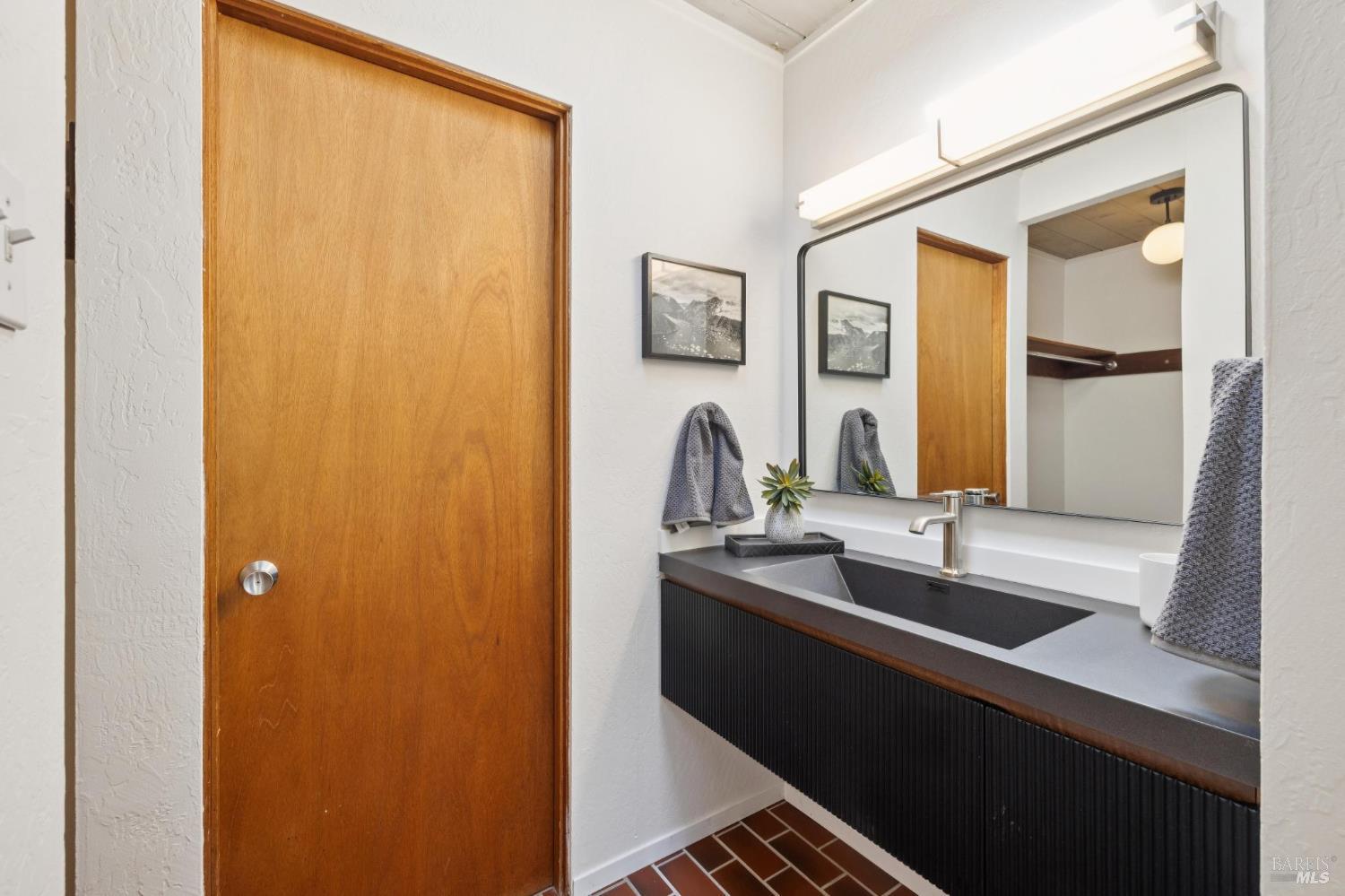 1200 Idylberry Road San Rafael, CA 94903 - Photo 38 of 58 a bathroom with a sink and a mirror