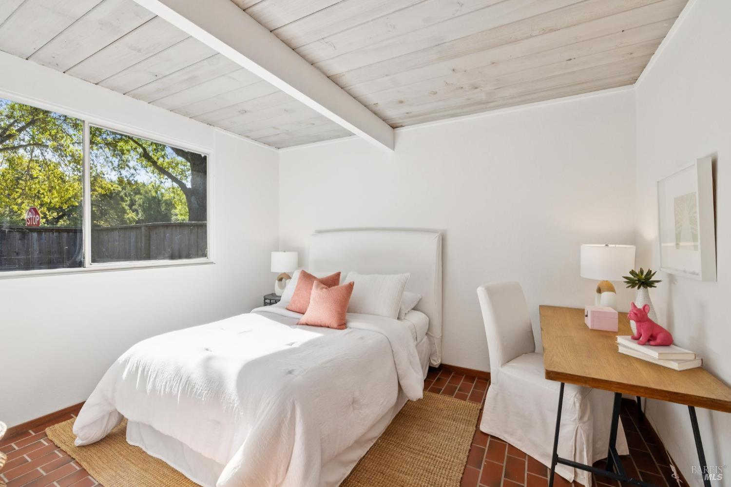 1200 Idylberry Road San Rafael, CA 94903 - Photo 43 of 58 a bedroom with a bed a dresser and a large window