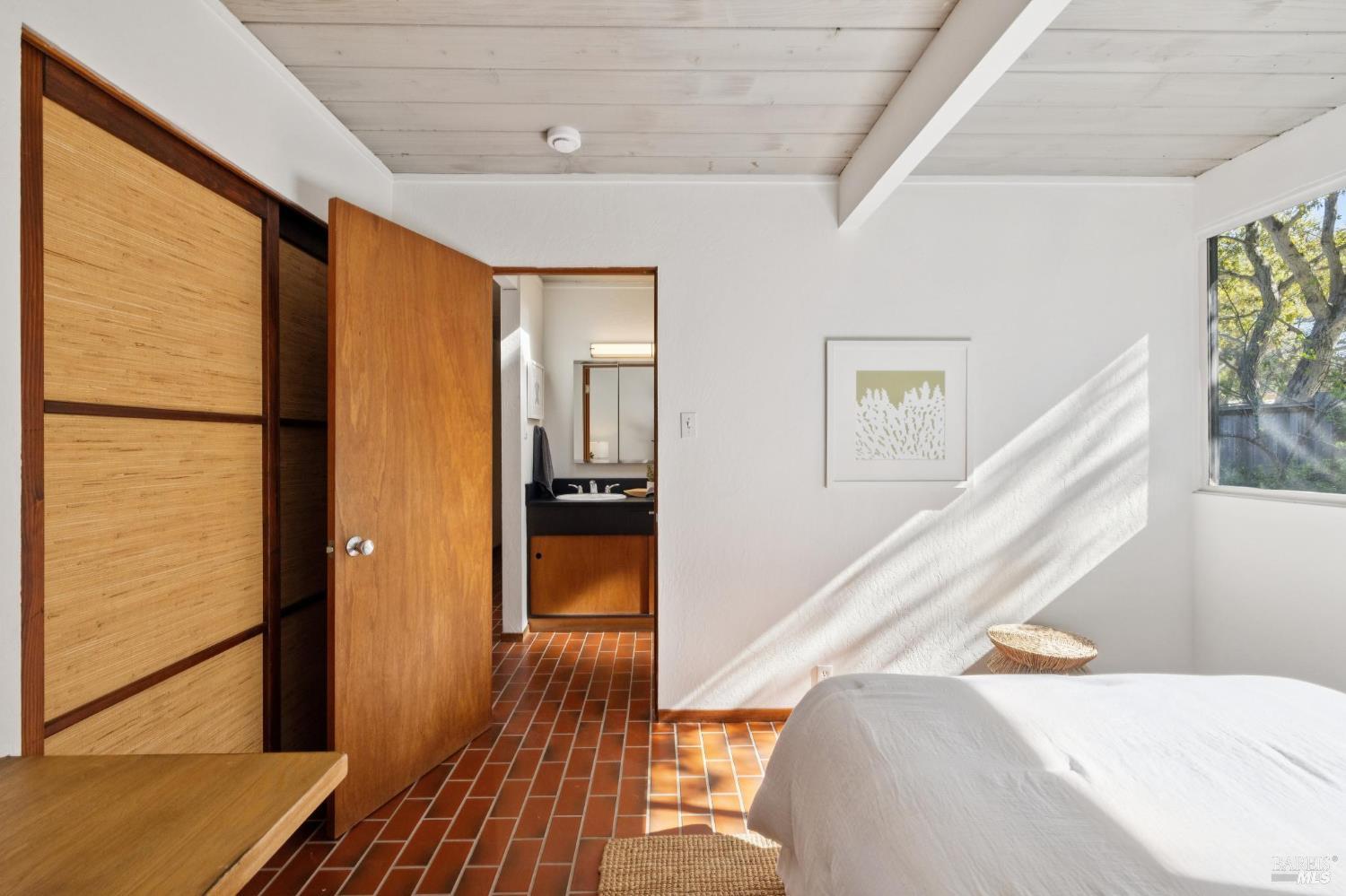 1200 Idylberry Road San Rafael, CA 94903 - Photo 44 of 58 a view of a hallway with wooden floor and staircase