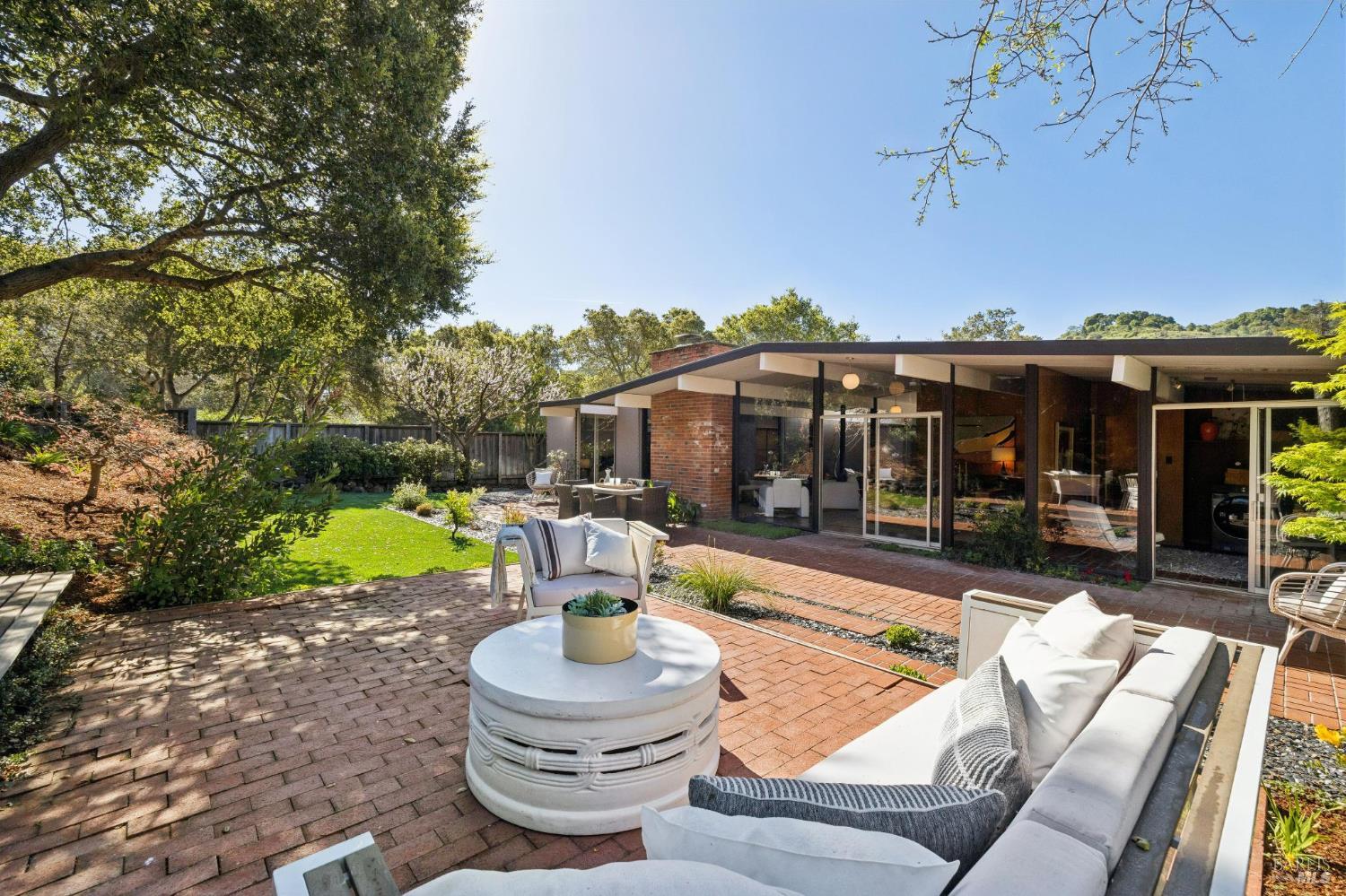 1200 Idylberry Road San Rafael, CA 94903 - Photo 6 of 58 a view of a house with backyard porch and furniture