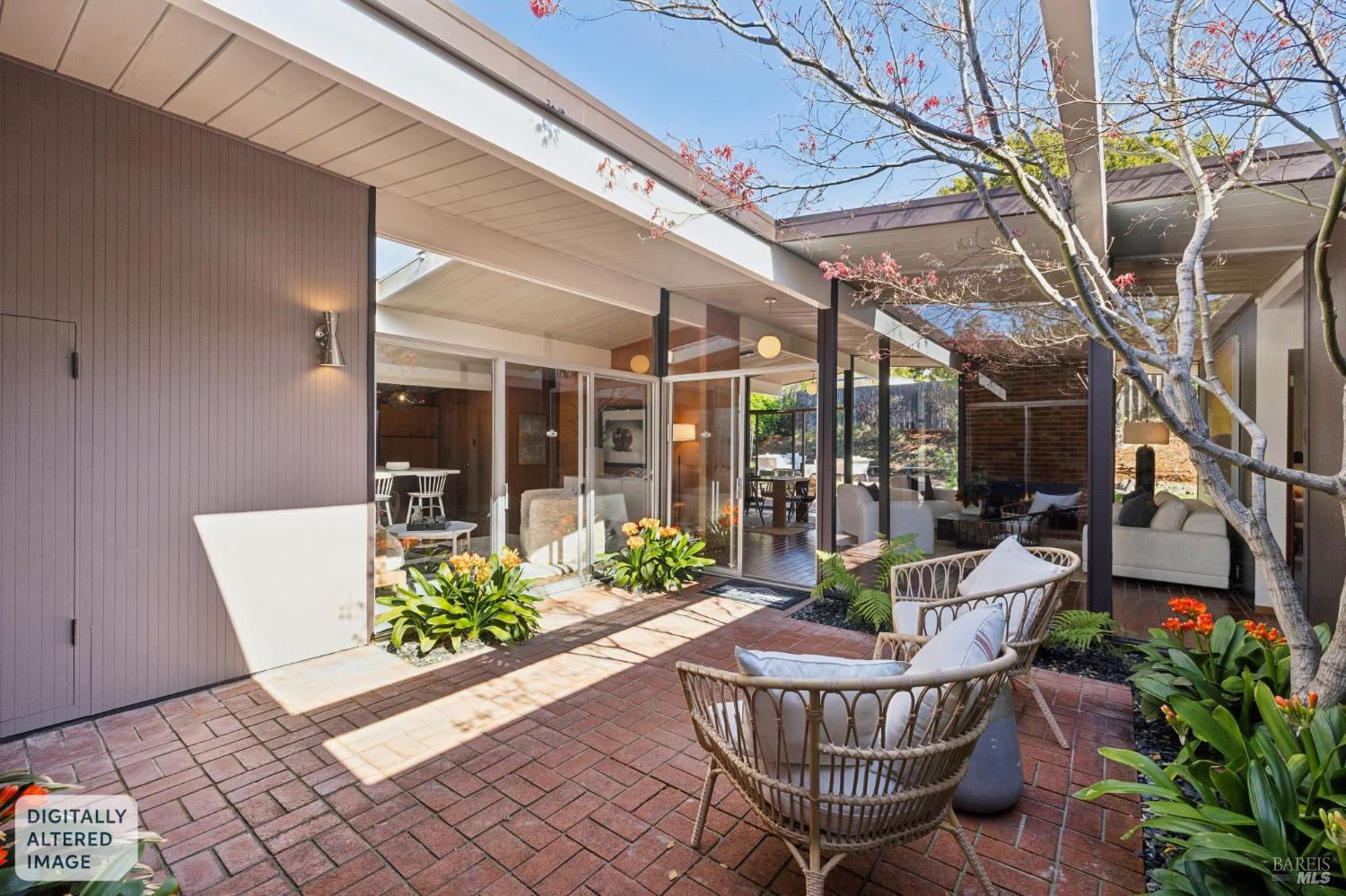 1200 Idylberry Road San Rafael, CA 94903 - Photo 10 of 58 a view of a chair and table in patio with a potted plant