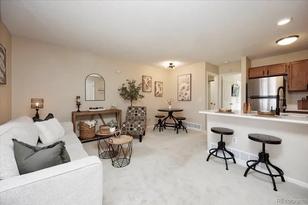 a kitchen with a sink and a stove top oven
