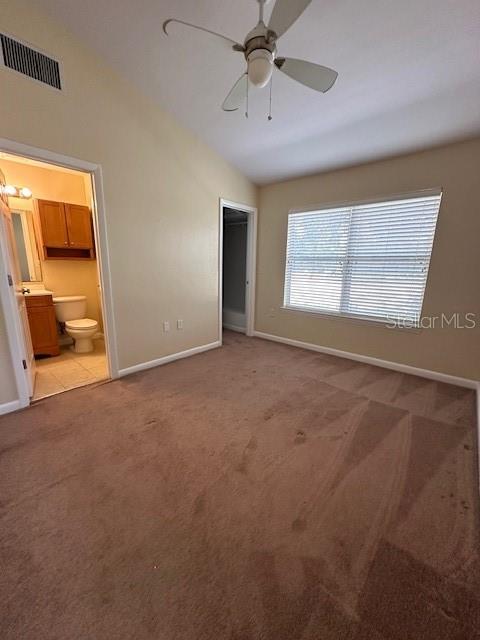 3031 Southwest Archer Road, Unit 2A Gainesville, FL 32608 - Photo 9 of 10 a view of an empty room with a window