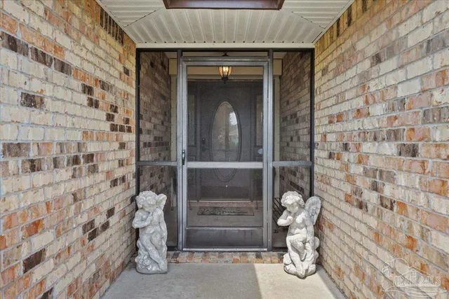 a front view of a house with a door
