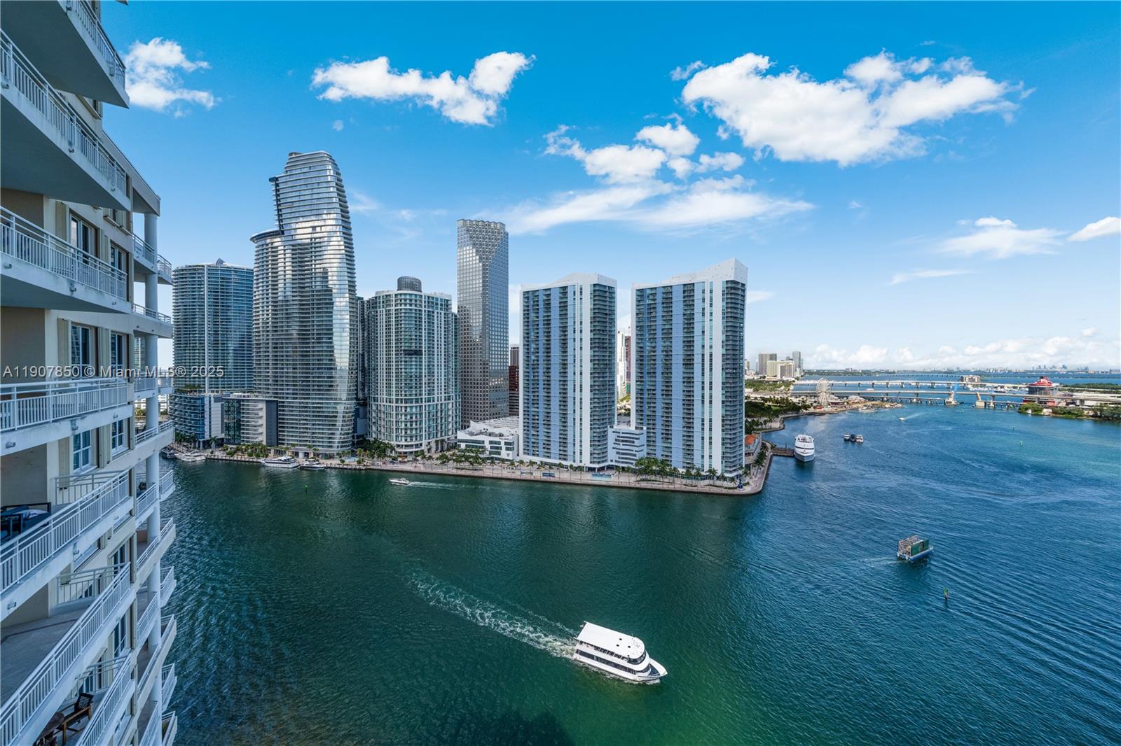 888 Brickell Key Drive, Unit 2610 Miami, FL 33131 - Photo 8 of 37 a view of a city with tall buildings