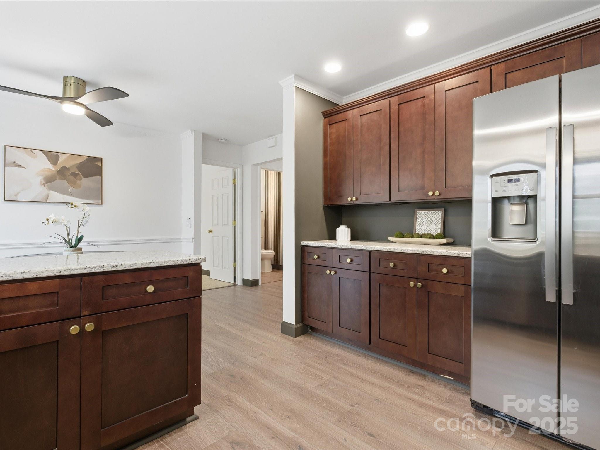 3909 Brownes Ferry Road Charlotte, NC 28269 - Photo 11 of 47 a kitchen with stainless steel appliances granite countertop a refrigerator a sink and dishwasher