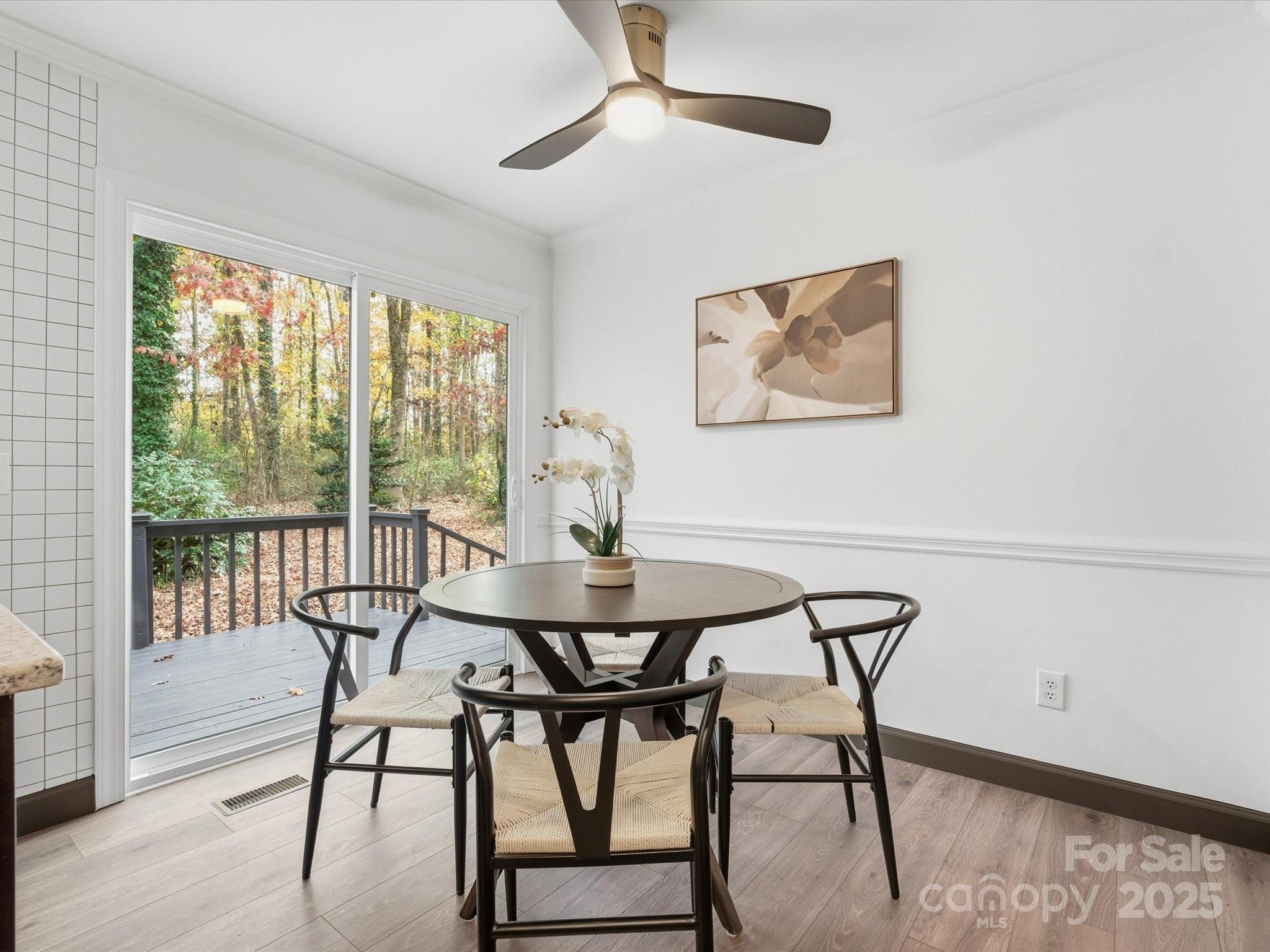 3909 Brownes Ferry Road Charlotte, NC 28269 - Photo 13 of 47 a view of a dining room with furniture window and outside view