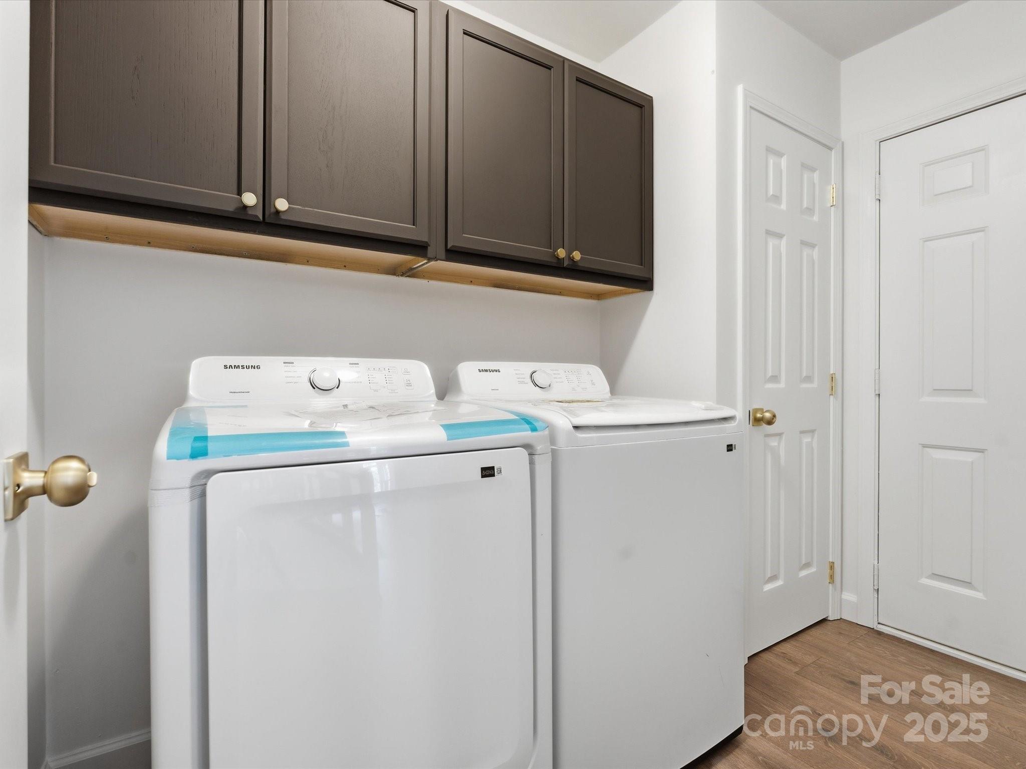 3909 Brownes Ferry Road Charlotte, NC 28269 - Photo 15 of 47 a utility room with dryer and washer