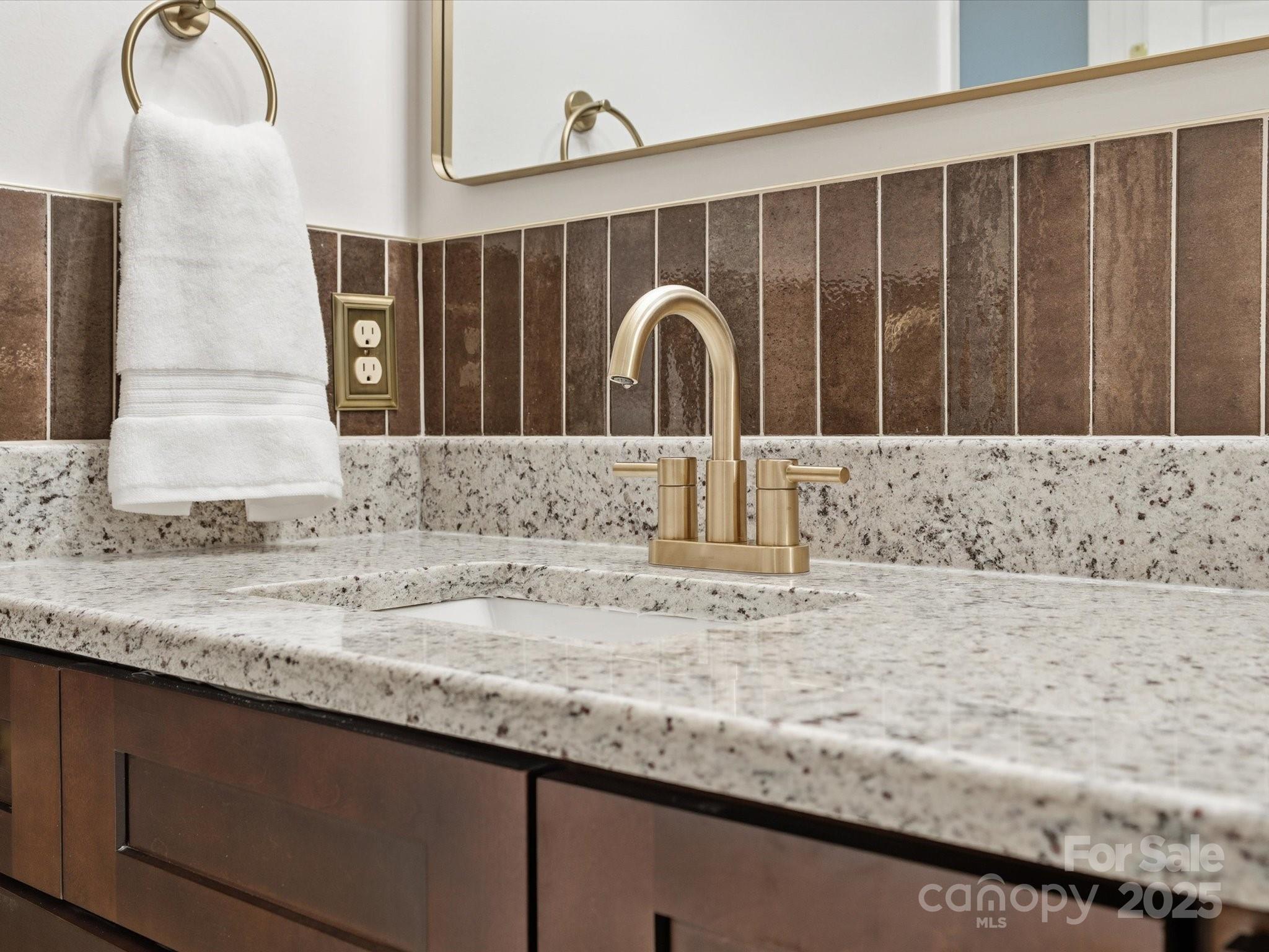 3909 Brownes Ferry Road Charlotte, NC 28269 - Photo 18 of 47 a bathroom with a granite countertop sink and a mirror