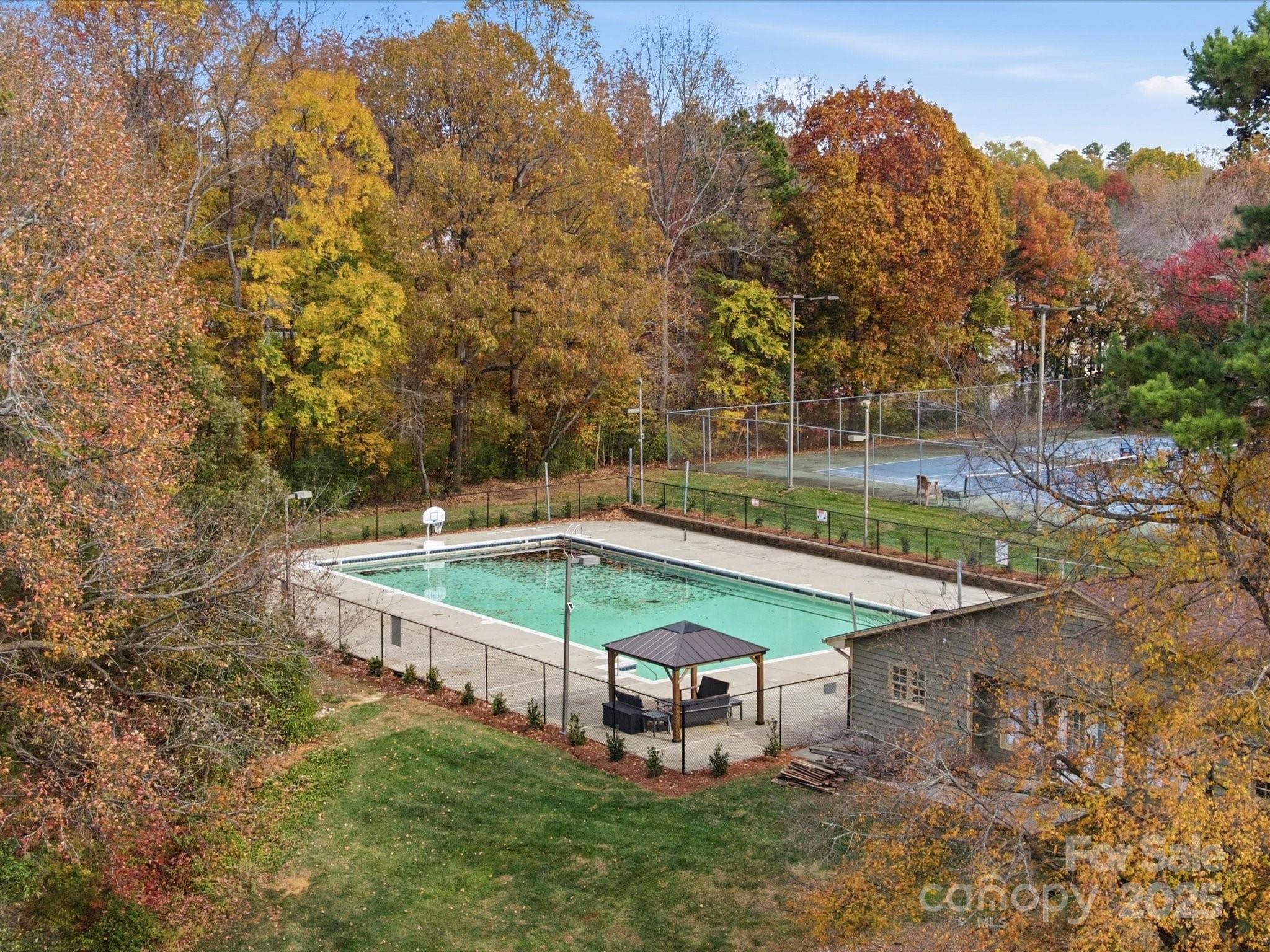 3909 Brownes Ferry Road Charlotte, NC 28269 - Photo 41 of 47 an aerial view of a house with a yard