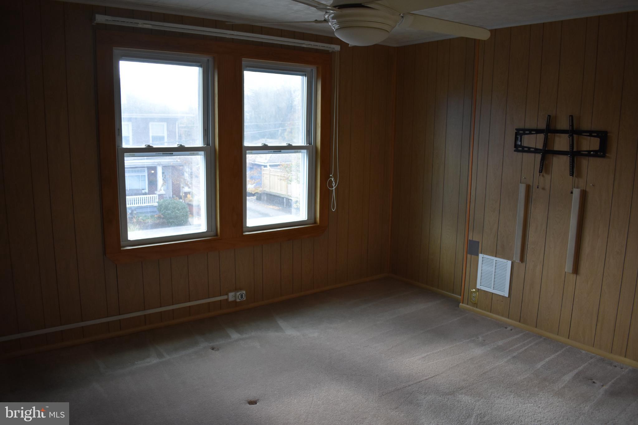 409 Walnut Street West Reading, PA 19611 - Photo 11 of 24 a view of an empty room with a window