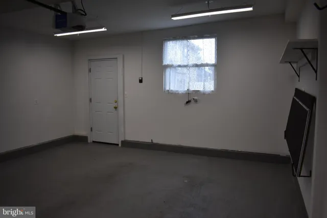 a view of a room with rack on the wall