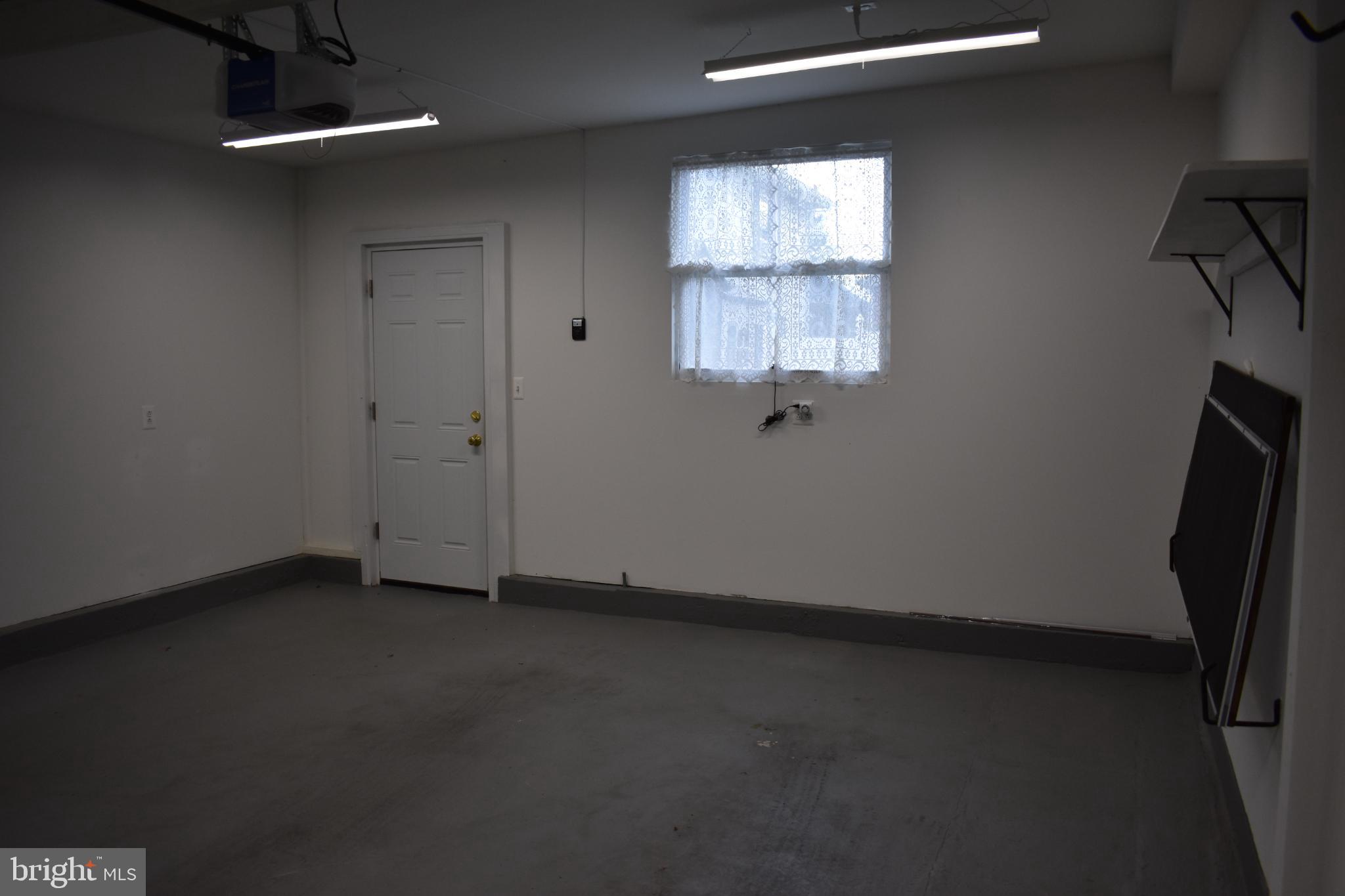 409 Walnut Street West Reading, PA 19611 - Photo 18 of 24 an empty room with a window