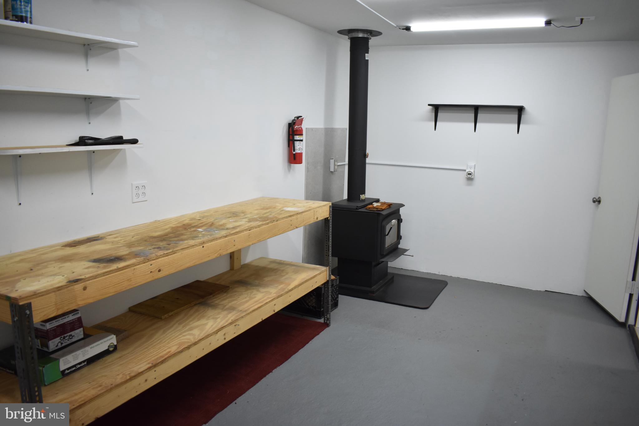 409 Walnut Street West Reading, PA 19611 - Photo 20 of 24 a bedroom with a bed and a ceiling fan