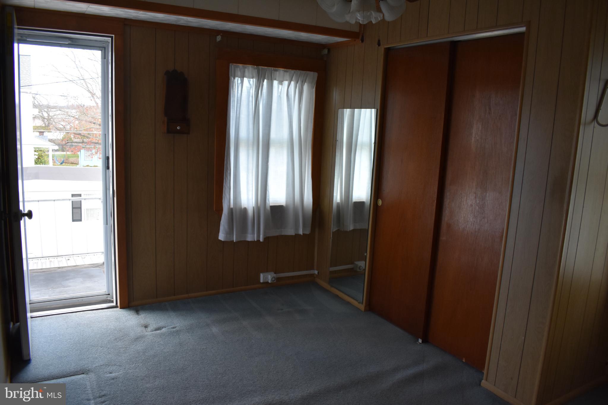 409 Walnut Street West Reading, PA 19611 - Photo 4 of 24 an empty room with windows