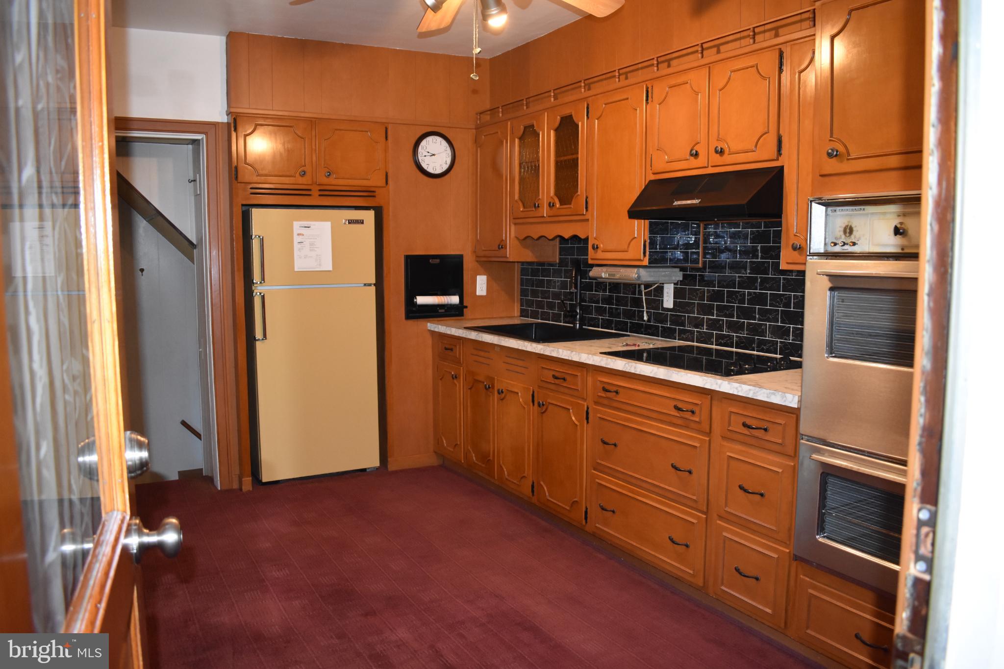 409 Walnut Street West Reading, PA 19611 - Photo 8 of 24 a bathroom with a sink and a mirror