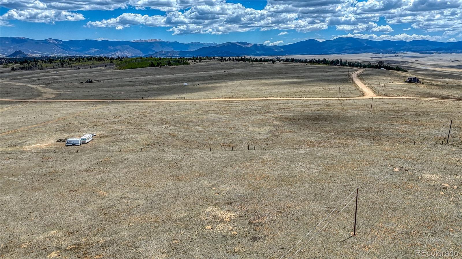 705 Rhyolite Drive Como, CO 80432 - Photo 5 of 19 a view of a room with a fireplace