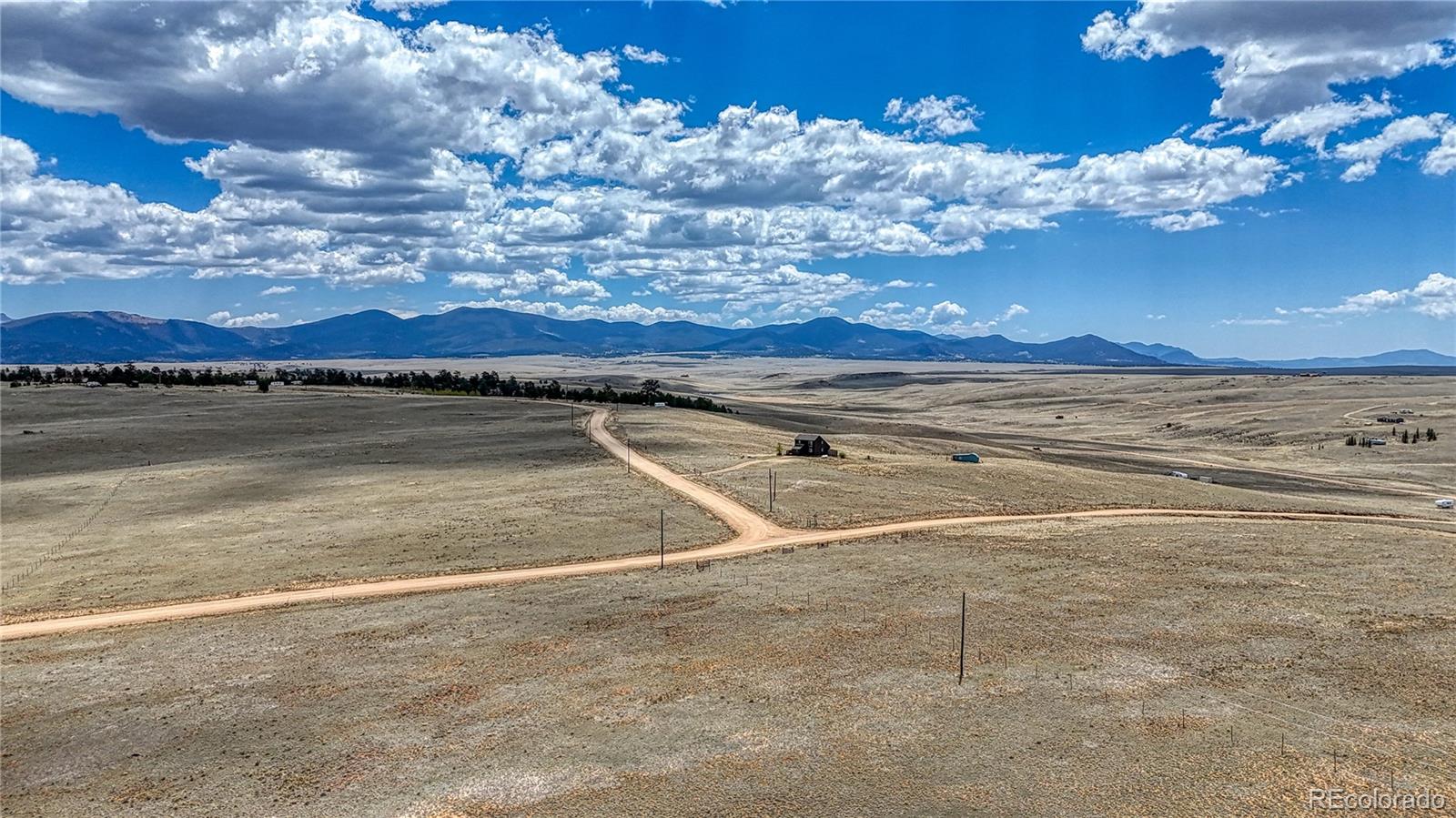 705 Rhyolite Drive Como, CO 80432 - Photo 8 of 19 a view of an ocean a building in the background